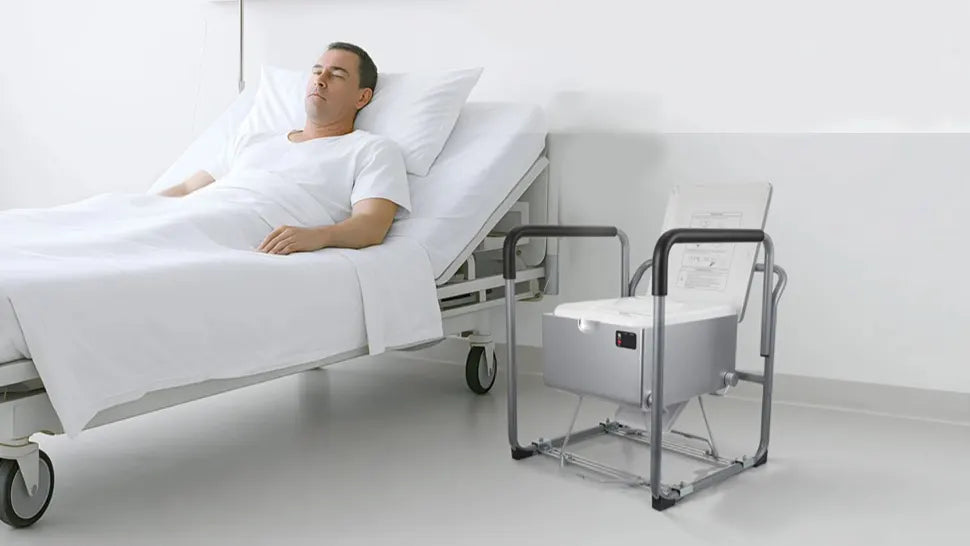 Portable toilet with handrails for the elderly