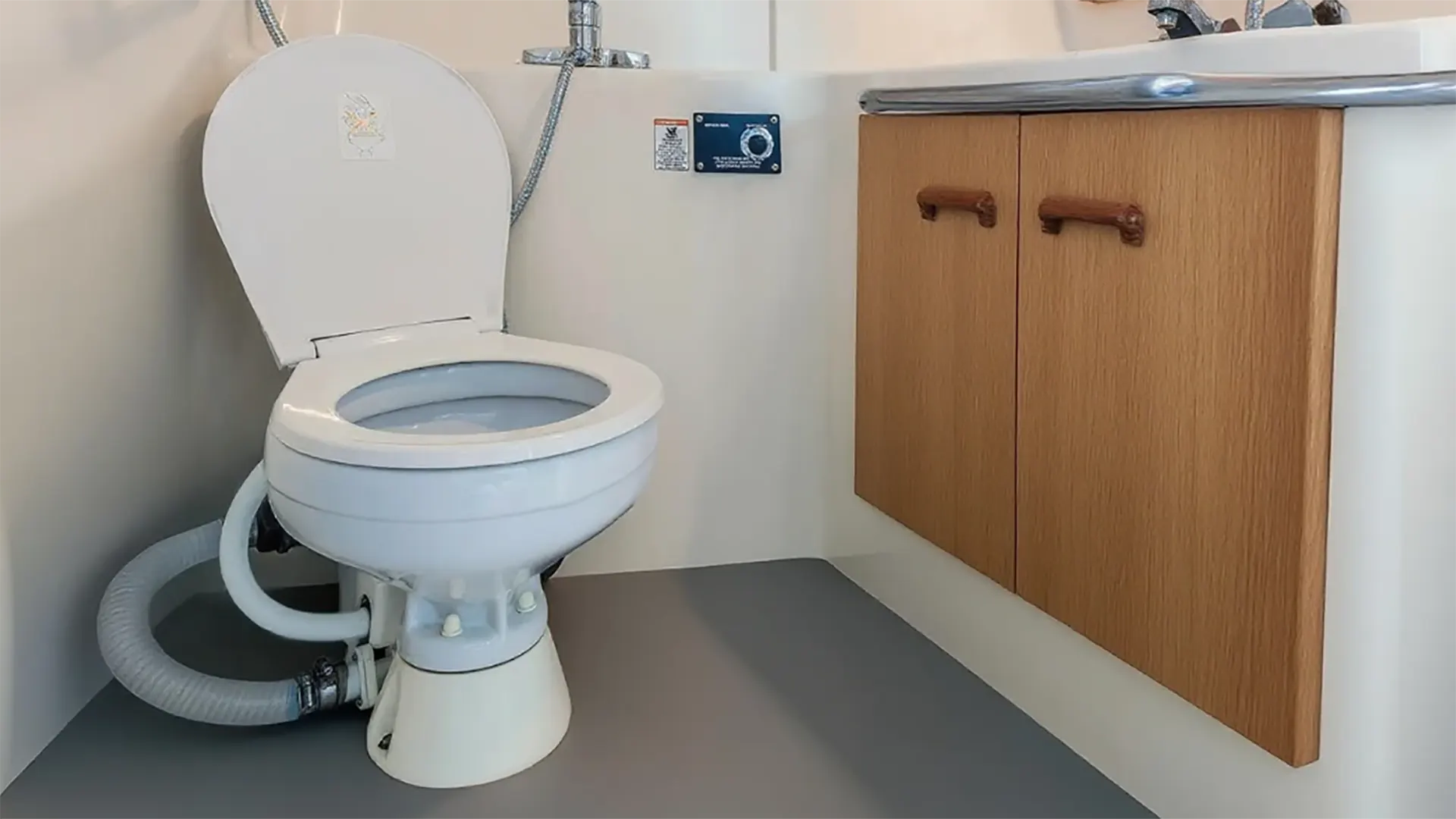 Marine toilet size and placement