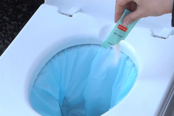 Pour the coagulant into the dry flush toilet